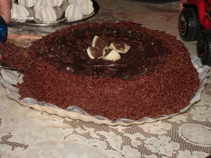 a chocolate cake sitting on top of a table