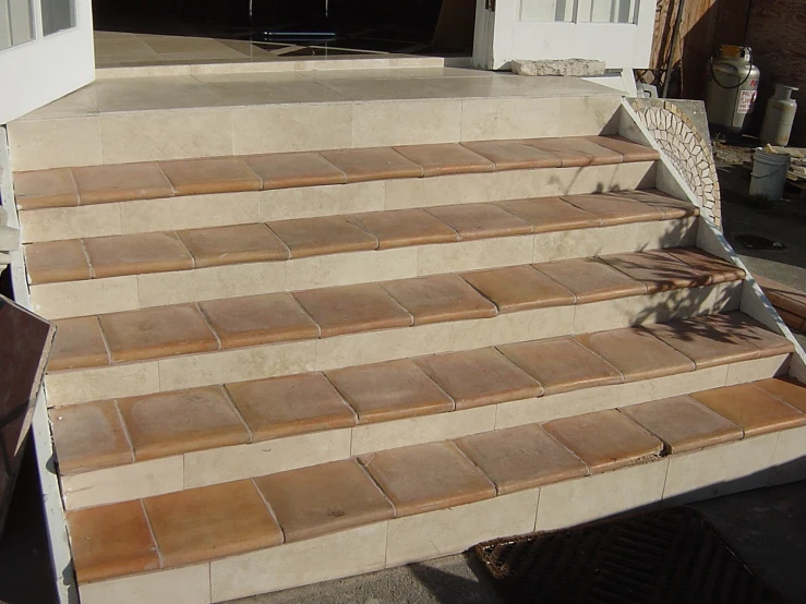 a large steps is made from cement tiles