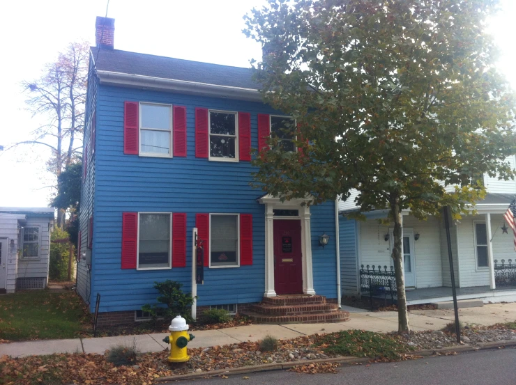 the red white and blue house has two doors