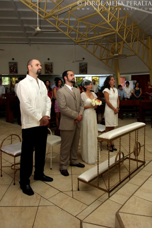 a groom and bride at their wedding ceremony