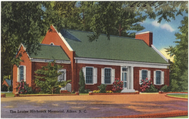 a large red house with white shutters on the front door