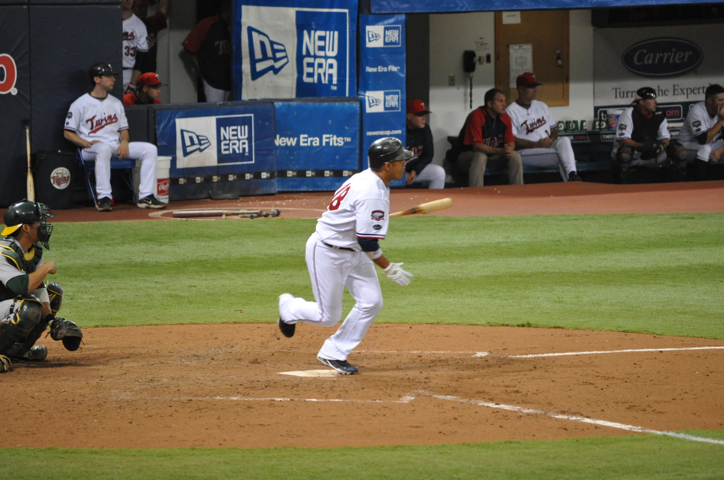 a baseball player has just pitched the ball