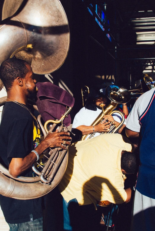 a trumpet player is playing a song at a musical performance