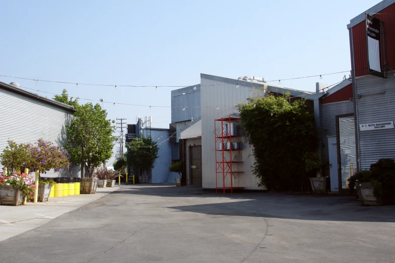 industrial looking buildings with landscaping in front and landscaping in back