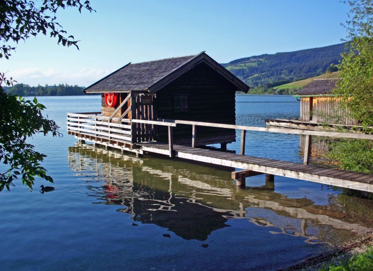 a small dock on the side of a large body of water