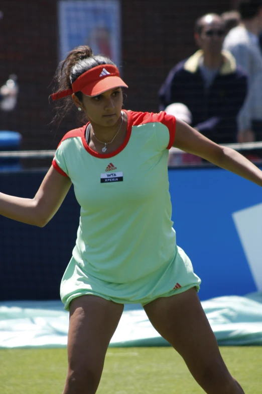 female tennis player in action on the court