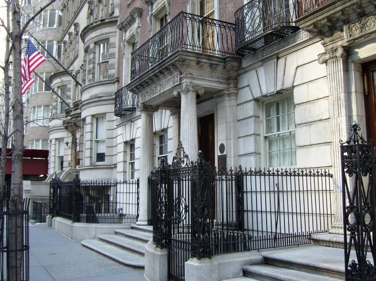 the front door and steps of an old building