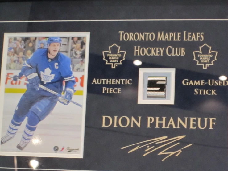 a signed pograph of an ice hockey player is in the shadow
