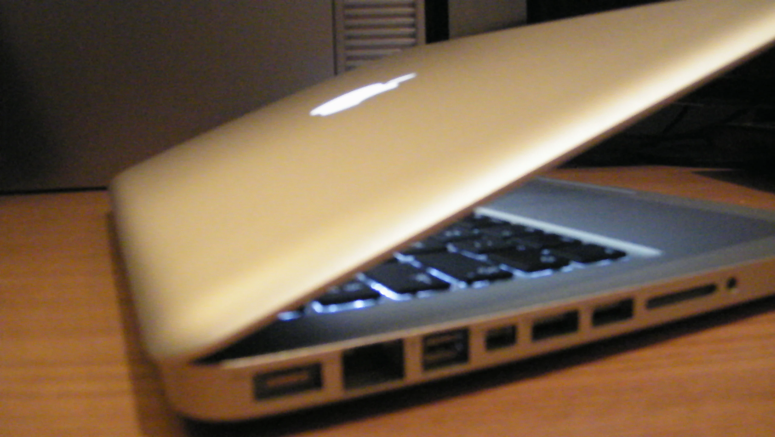 a laptop computer sitting on top of a desk