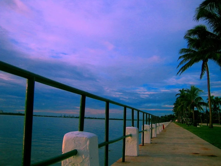 the pier near a small body of water at night