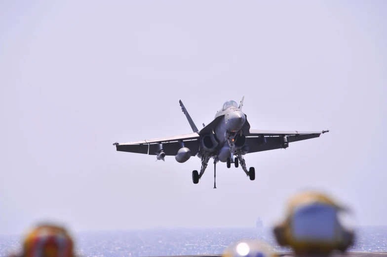 a fighter jet taking off from the runway