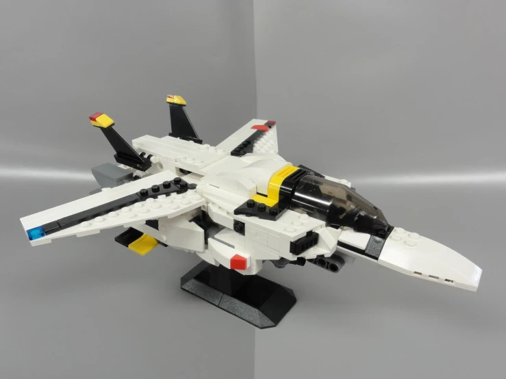 a toy model of a fighter jet is shown on the ground