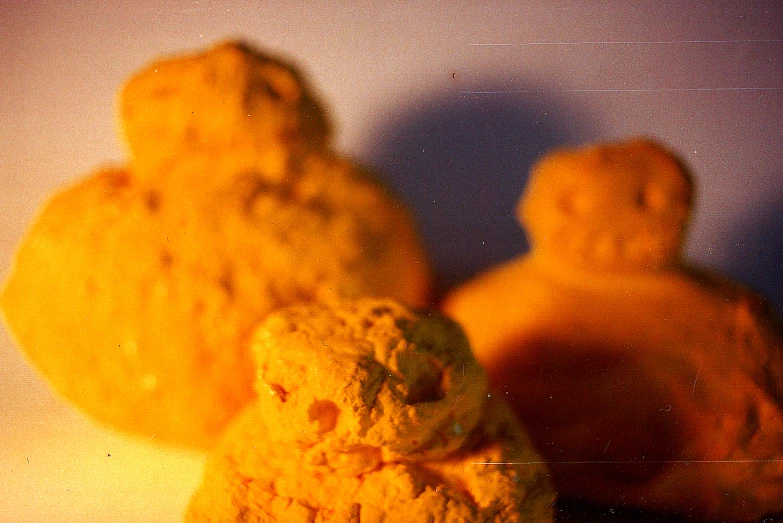 a group of three cookies sitting on top of a table