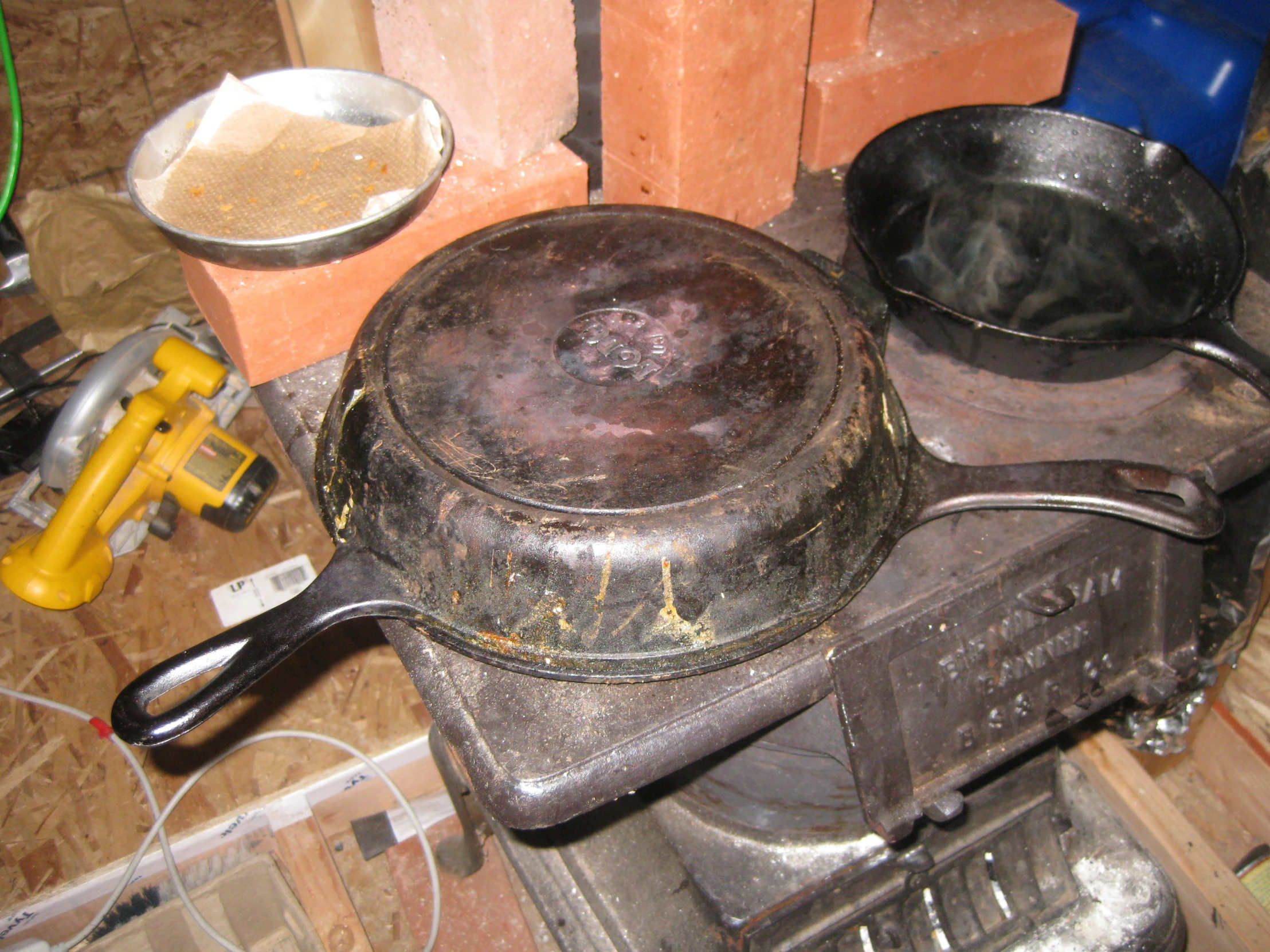 pots are sitting on top of an old stove