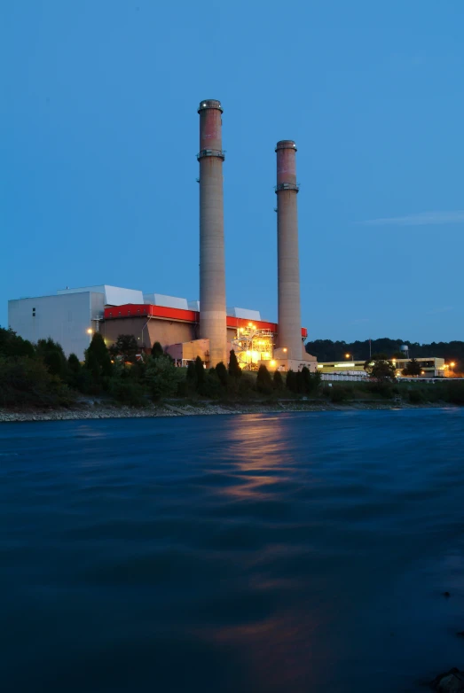 two large towers that are over water