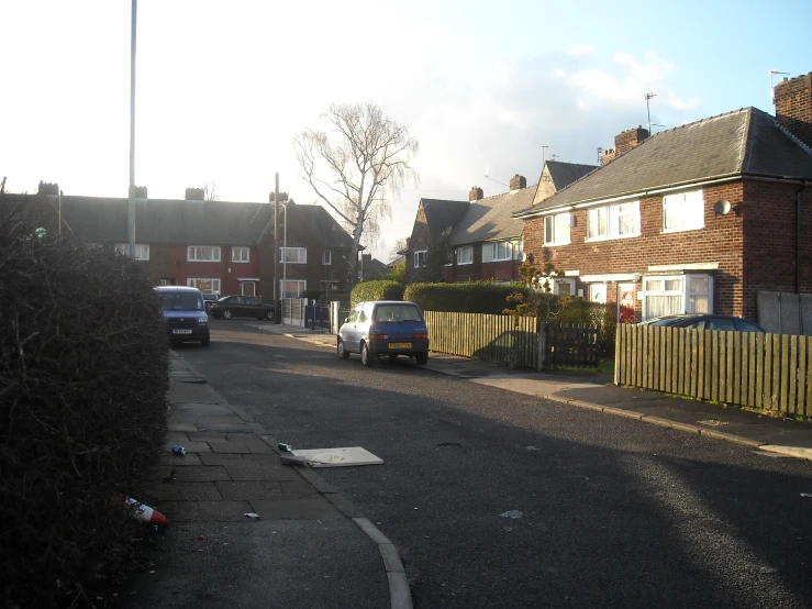 a car driving down the road during a sunny day