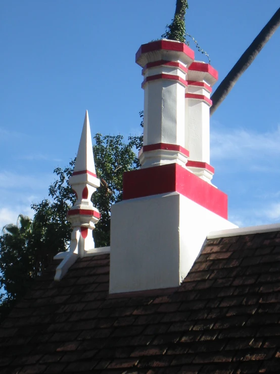 a pole sticking out of the roof of a house