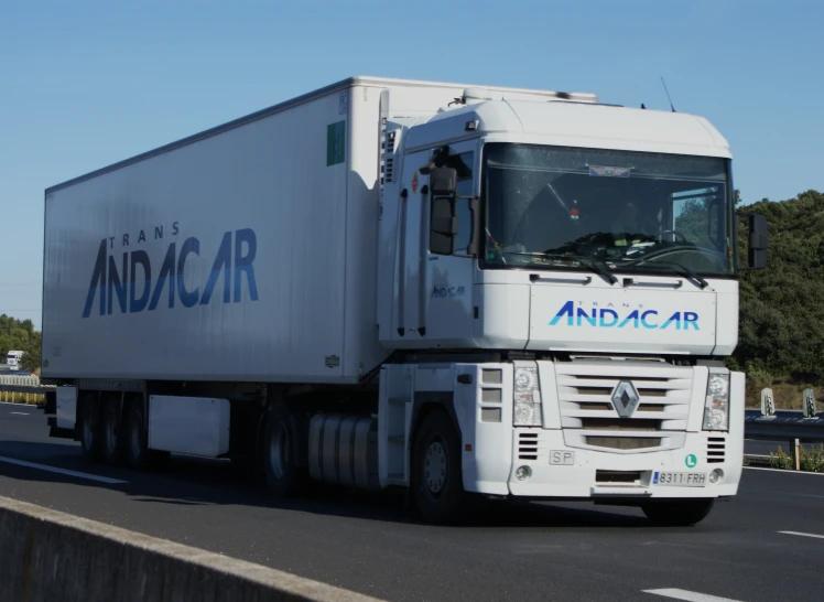 a large white truck with the word andac on it's side