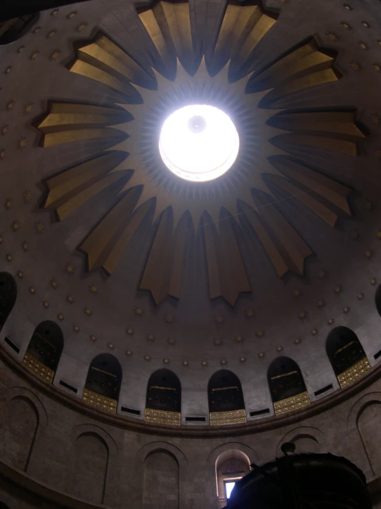 the dome on the ceiling inside of a church