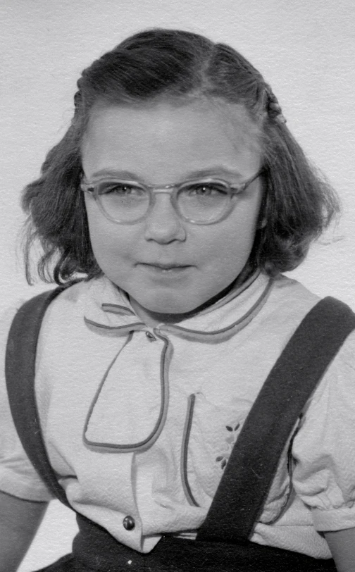 an old po of a girl with glasses