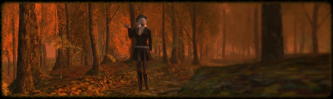 a woman standing in the middle of a forest with orange lighting