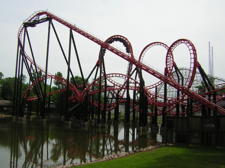 the roller coaster is almost halfway submerged in the water