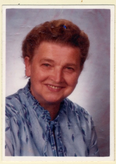 an old po of a woman's face with a white background