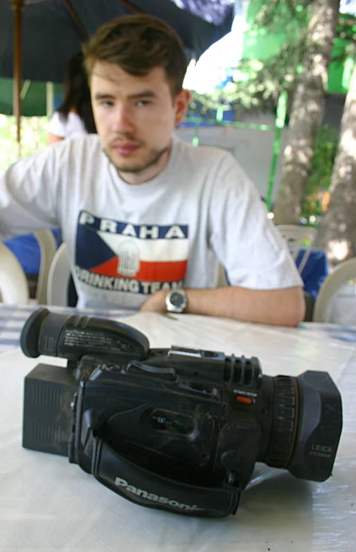 a camera and a video camera on the table