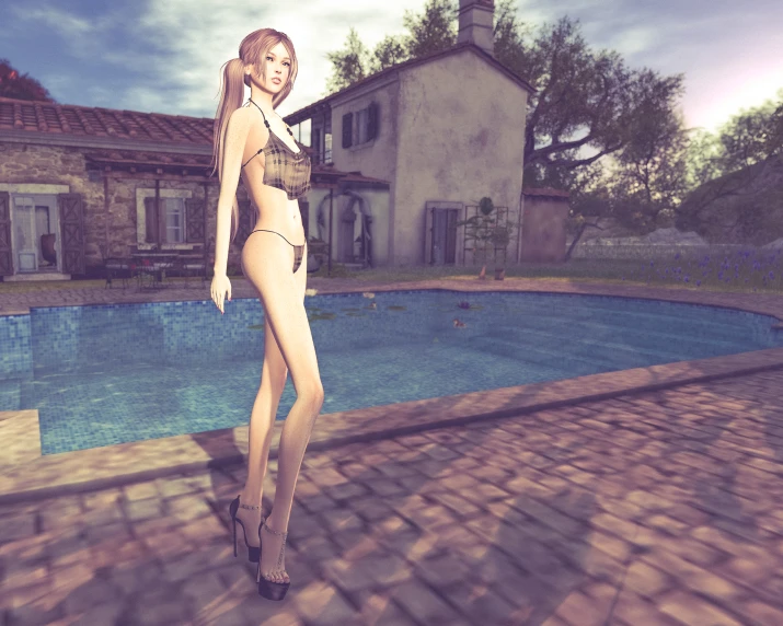 the female is standing by the swimming pool