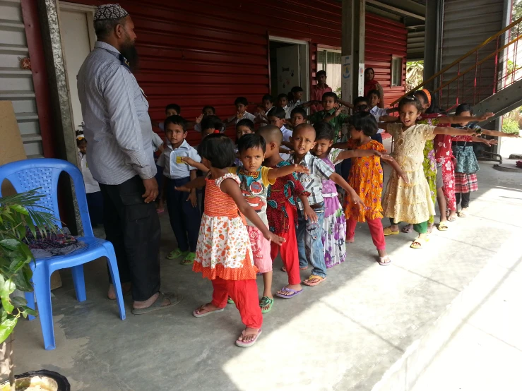 group of children in indian dress at small gathering