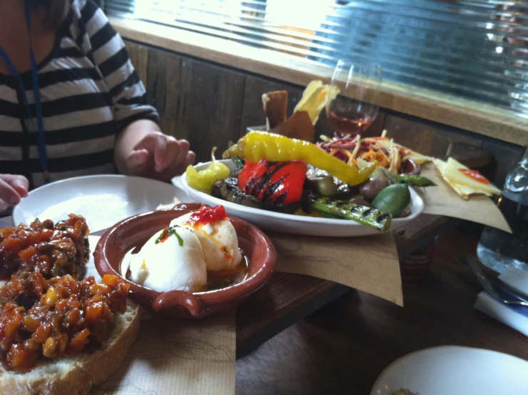 a person is eating some food at the restaurant