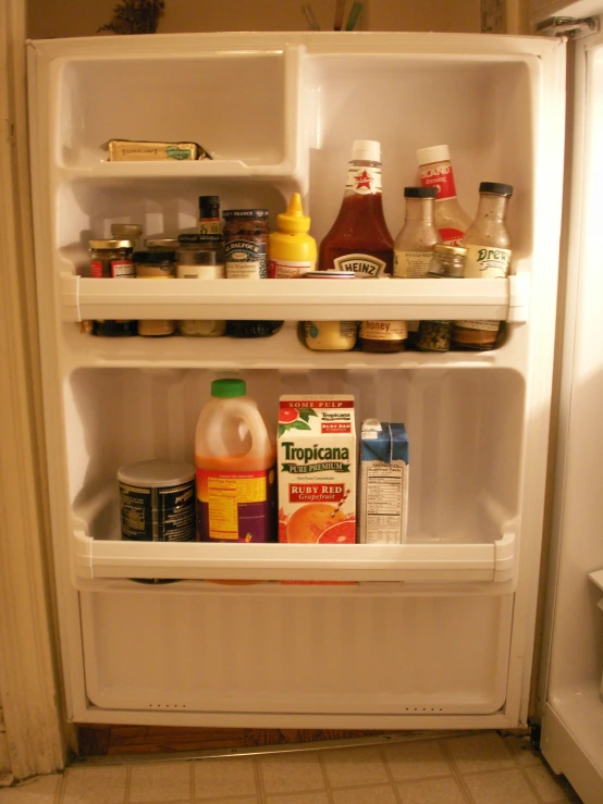 a refrigerator that is packed with many different foods