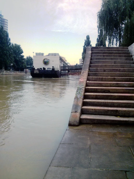 stairs lead down to boats going under them