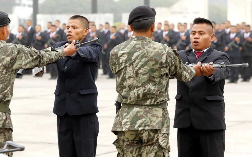 men in suits are practicing the traditional korean martial techniques