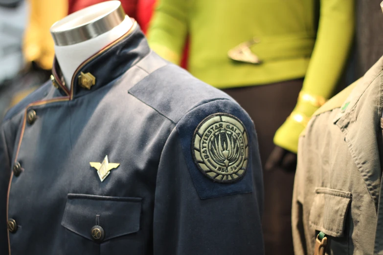 close up view of uniform on display with people in background