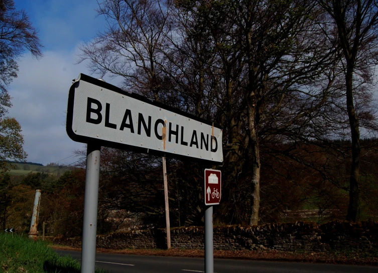 there is a street sign with the word blancciland on it