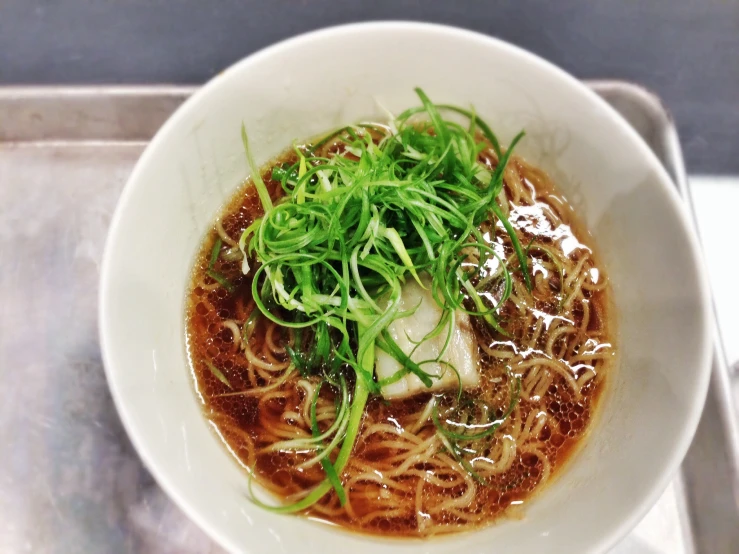 a bowl filled with some kind of noodles