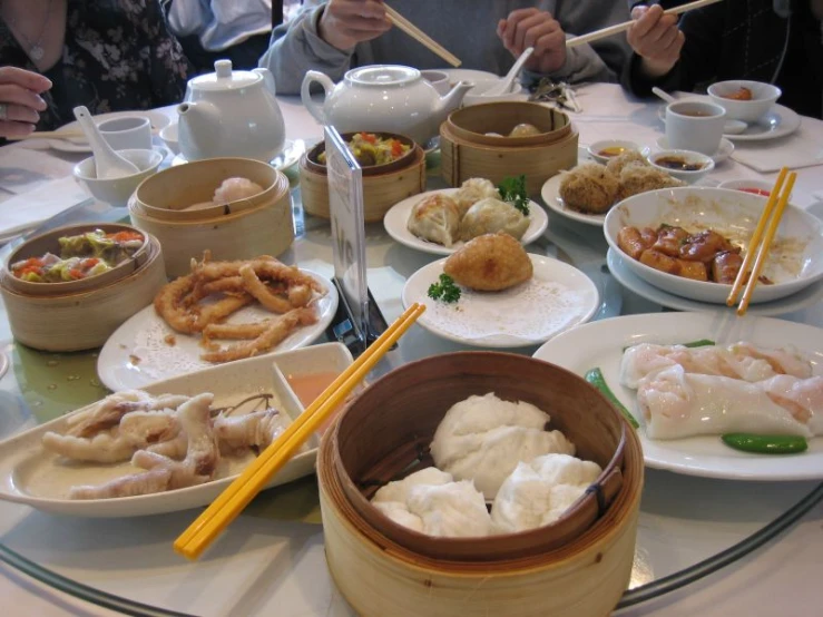 many foods are shown on a table ready to eat