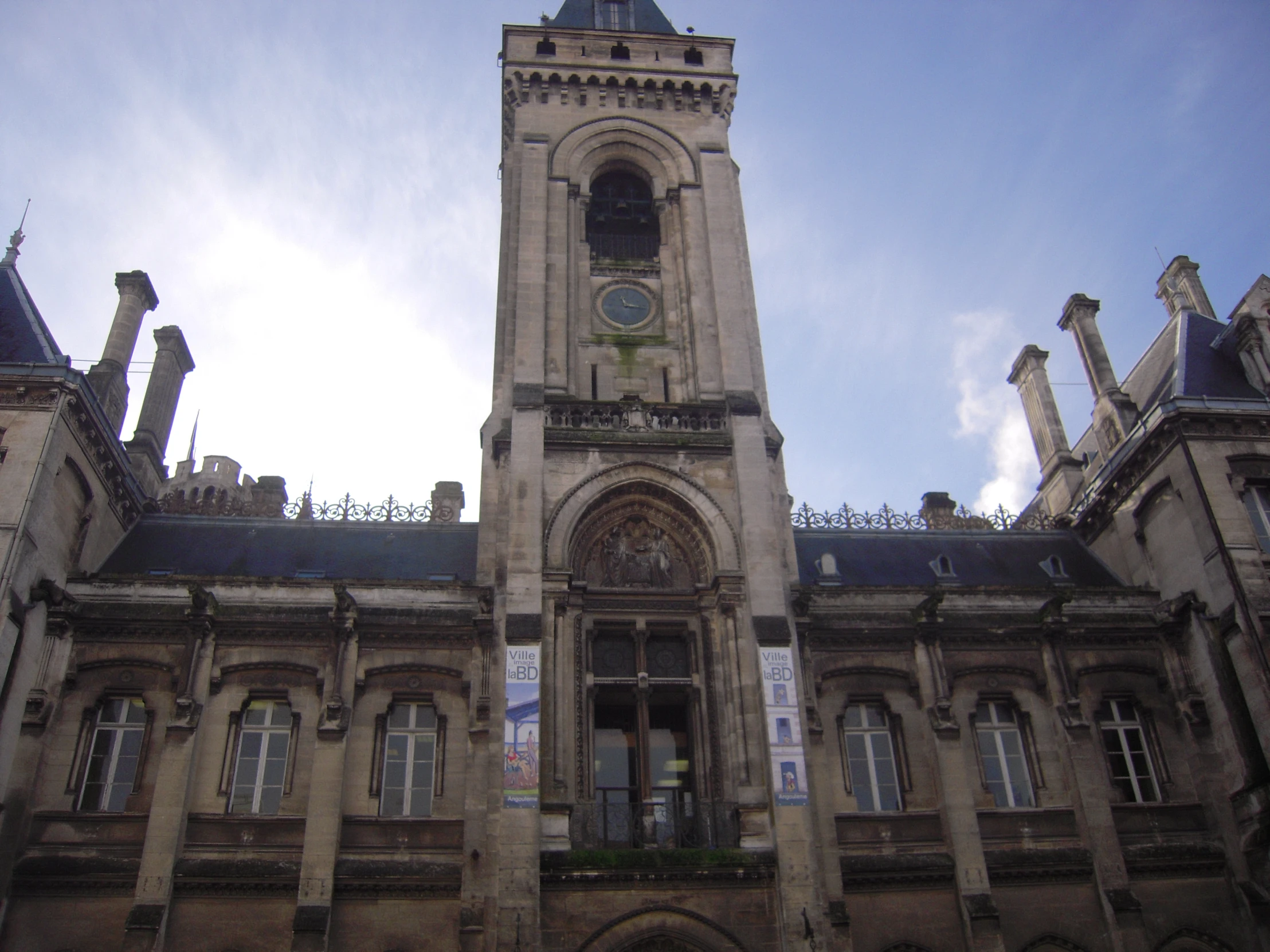 an old building with a tower on the top