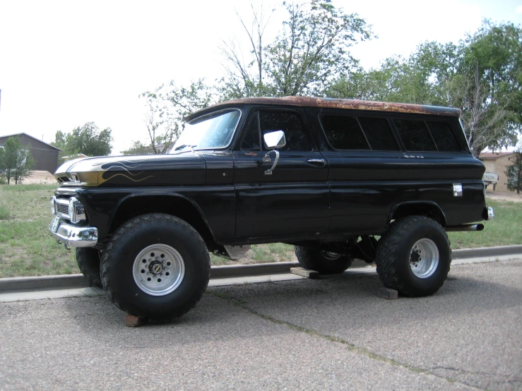 a large truck sitting in front of a field