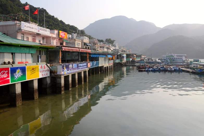 a body of water with buildings and boats