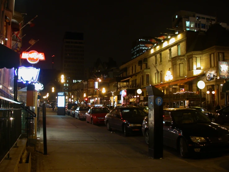 a view down a city street at night time