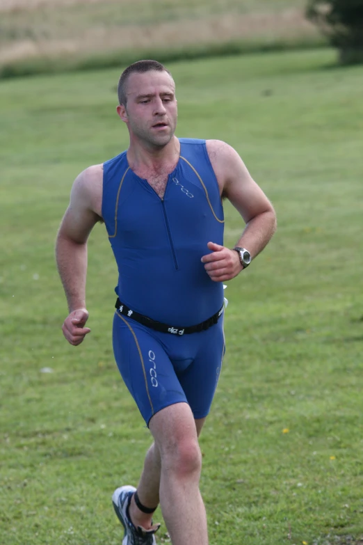 a man that is in some kind of race running