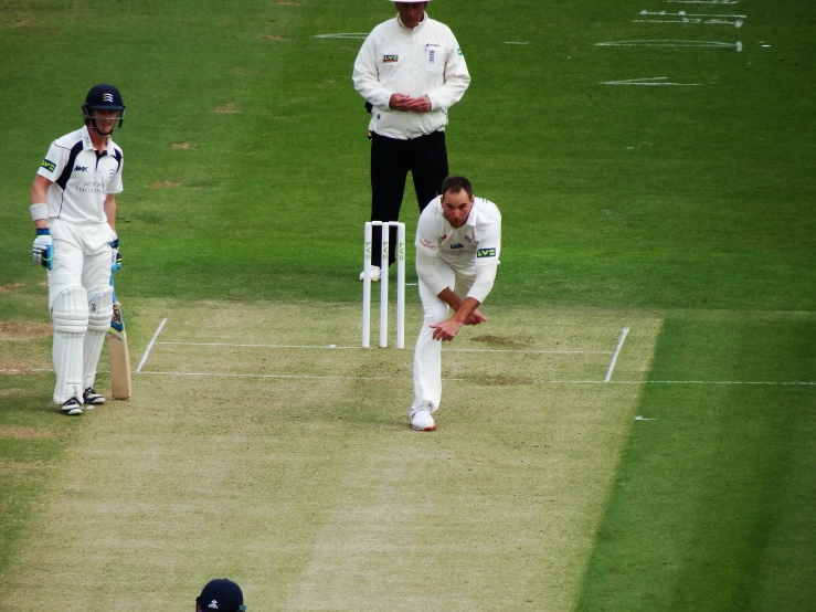 a cricket player gets caught by a low ball