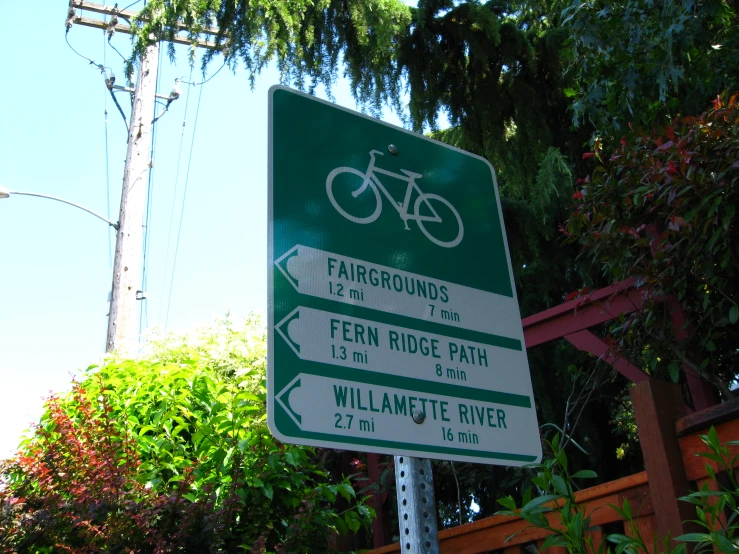 a sign in the city warns cyclists to follow