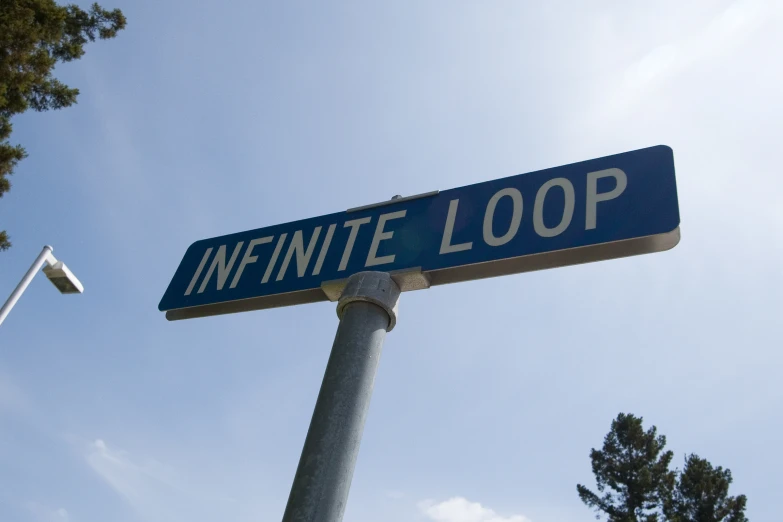 a street sign indicating an infinite loop