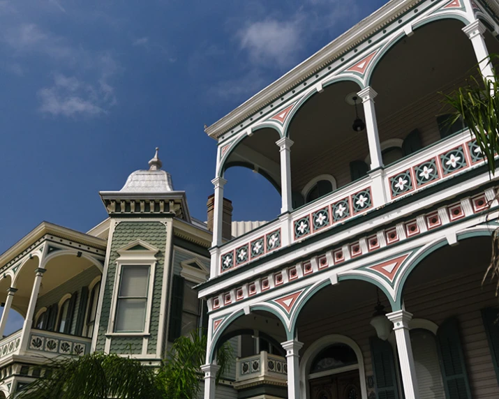 the balcony is decorated with ornate arches and decorative accents