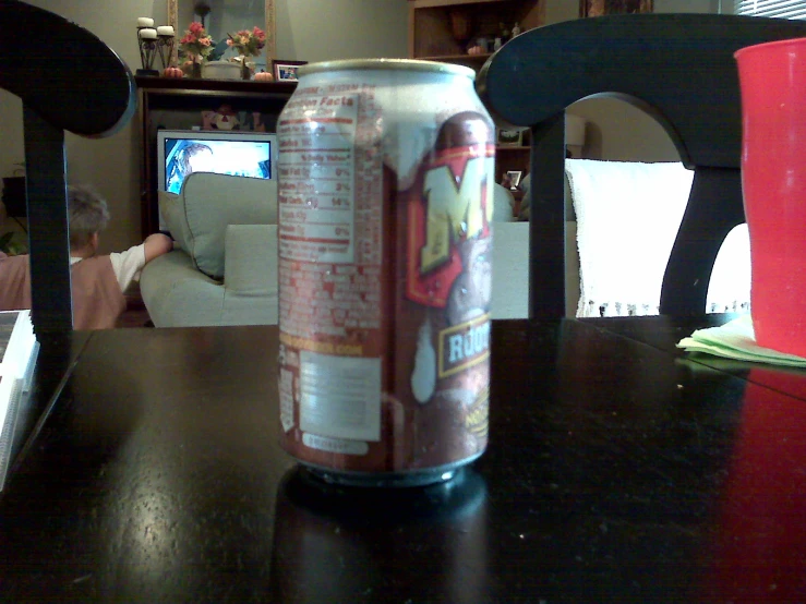 a can of soda on top of a table