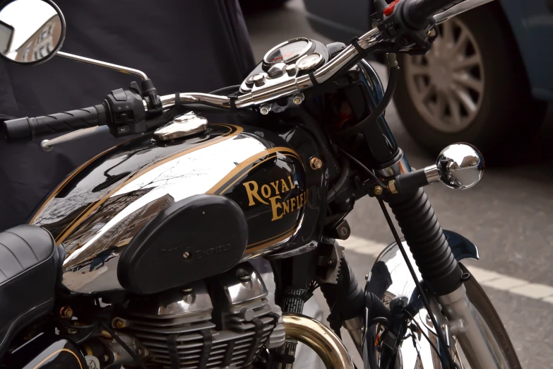 an old motorcycle with an image painted on the back seat