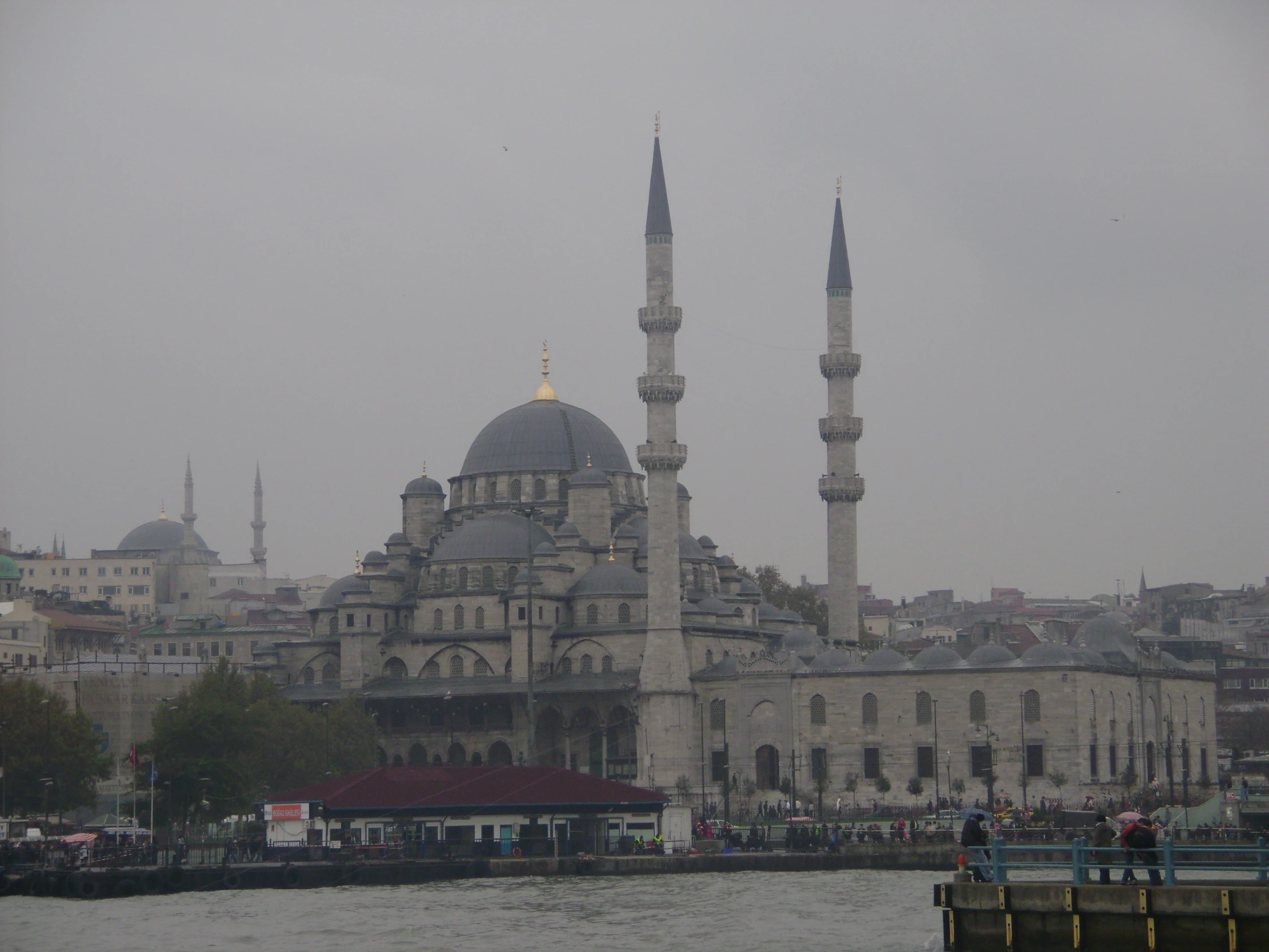 the blue mosque is in a hazy sky